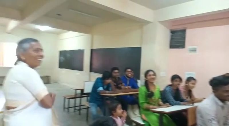 Teacher with students at Mohre PU College